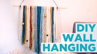 DIY Yarn Wall Hanging  HGTV [upl. by Elladine]